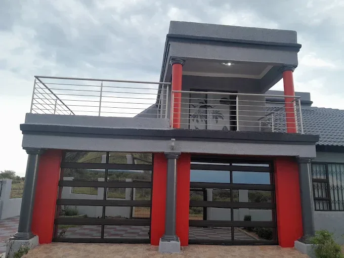 Stainless steel balcony balustrade and garage doors
